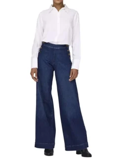 Pantalon en coton mélangé bleu indigo uni à coupe bootcut fermé par des boutons