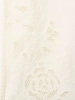 Pantalon en coton mélangé écru uni pourvu de détails brodés et ajourés