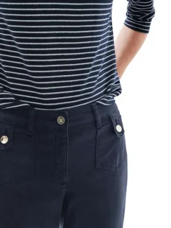 Pantalon en coton mélangé marine uni avec une coupe flare à zip et à bouton
