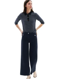 Pantalon en coton mélangé marine uni avec une coupe flare à zip et à bouton