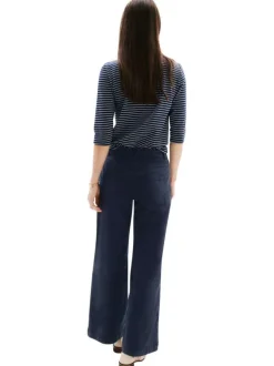 Pantalon en coton mélangé marine uni avec une coupe flare à zip et à bouton