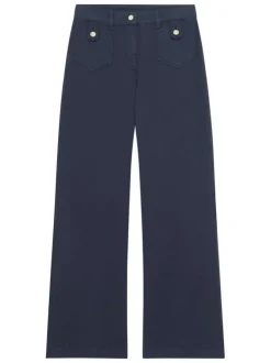 Pantalon en coton mélangé marine uni avec une coupe flare à zip et à bouton