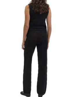Pantalon en coton noir uni en maille ajourée pourvu d'un coupe droite