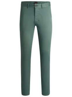 Pantalon en coton vert uni avec une coupe slim fit et des détails orange