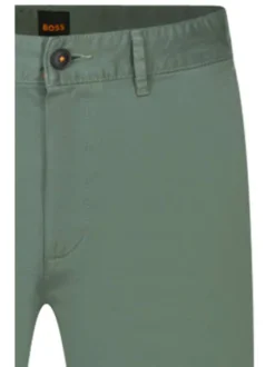 Pantalon en coton vert uni avec une coupe slim fit et des détails orange