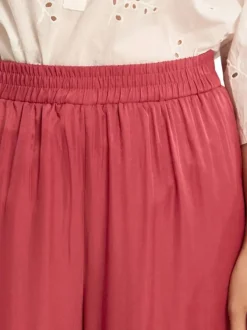 Pantalon framboise uni pourvu d'une coupe large et d'une taille haute