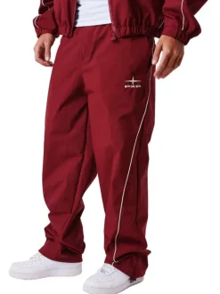 Pantalon jogging bordeaux uni pourvu d'une taille élastiquée