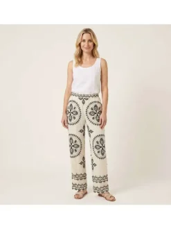 Pantalon jogging écru à motifs pourvu d'une taille intermédiaire