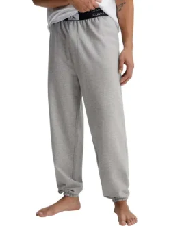 Pantalon Jogging en coton gris uni avec une coupe slim et poches latérales