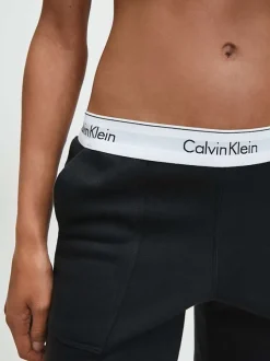 Pantalon Jogging en coton noir uni coupe slim avec des poches latérales
