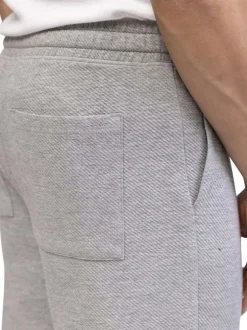 Pantalon jogging gris clair uni avec une coupe droite et 4 poches