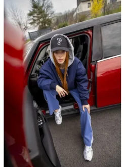 Pantalon jogging Jess bleu à rayures avec une coupe bootcut et 4 poches