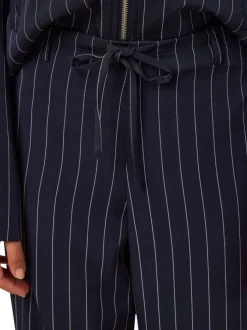 Pantalon jogging marine à rayures pourvu d’une coupe droite
