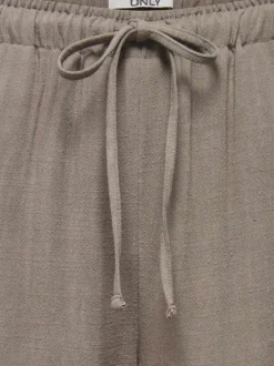 Pantalon jogging taupe uni pourvu d'un cordon de serrage à la taille