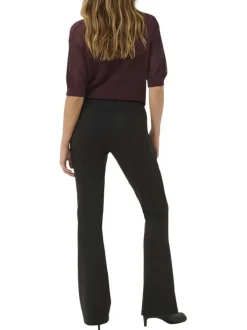 Pantalon legging noir uni avec une coupe flare et une taille élastiquée