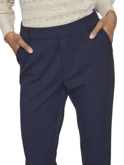 Pantalon marine uni avec une coupe cigarette et une taille intermédiaire