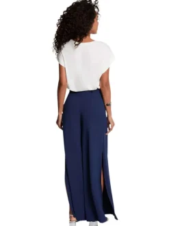 Pantalon marine uni pourvu d'une coupe large et de détails plissés