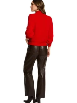 Pantalon marron en simili cuir pourvu d'une coupe bootcut et de poches
