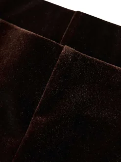 Pantalon marron en velours satiné fluide pourvu d'une coupe ample