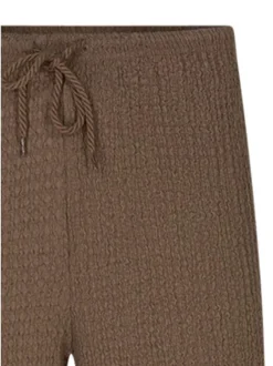 Pantalon marron uni pourvu d'une coupe bootcut et d'une taille haute