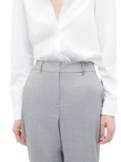 Pantalon noir imprimé pied de coq avec une coupe droite et une taille haute