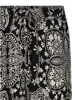 Pantalon noir à motifs pourvu d'une coupe droite et d'une taille élastiquée