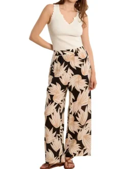 Pantalon noir à motifs pourvu d'une coupe large et d'une taille haute