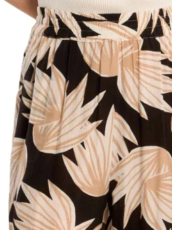 Pantalon noir à motifs pourvu d'une coupe large et d'une taille haute