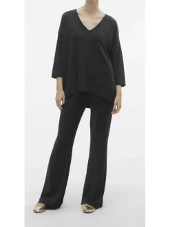 Pantalon noir pailleté avec une coupe bootcut et des surpiqûres ton sur ton