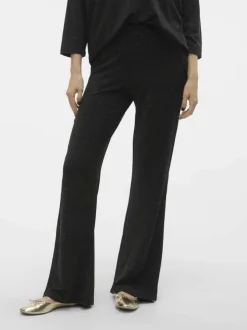 Pantalon noir pailleté avec une coupe bootcut et des surpiqûres ton sur ton