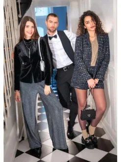 Pantalon noir uni aspect simili cuir avec une coupe droite et des poches