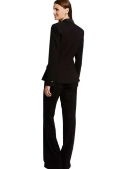 Pantalon noir uni avec une coupe bootcut et une taille intermédiaire