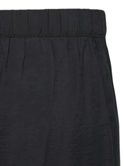 Pantalon noir uni avec une coupe bootcut et une taille élastiquée