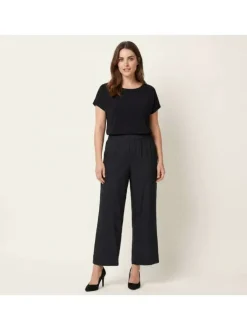 Pantalon noir uni avec une coupe bootcut et une taille élastiquée