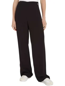 Pantalon noir uni avec une coupe large une taille haute et logo floqué