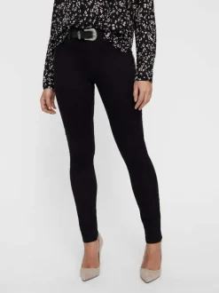 Pantalon noir uni avec une coupe skinny et une fermeture zippée boutonnée