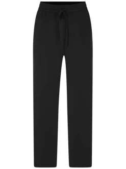 Pantalon noir uni pourvu d'une coupe large et d'une taille élastiquée