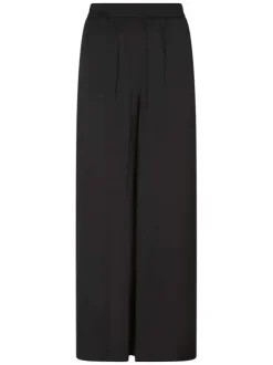 Pantalon noir uni pourvu d'une taille haute et d'une coupe large