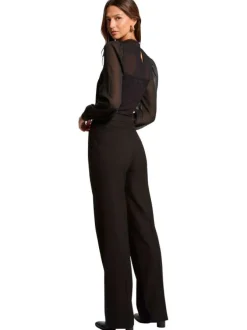 Pantalon à plis Chino noir uni coupe bootcut pourvu d'une taille cintrée