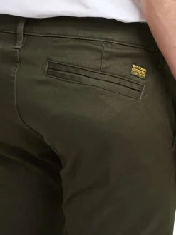 Pantalon 5 poches en coton kaki uni avec une coupe skinny et des passants