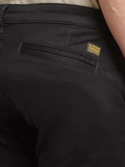 Pantalon 5 Poches en coton noir uni avec une coupe skinny et des poches