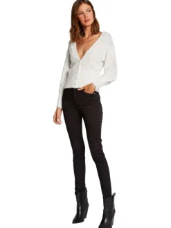Pantalon 5 poches noir uni à coupe slim avec bouton et rivets chromés