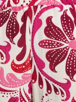 Pantalon rose à coupe droite orné de motifs et pourvu d'une taille élastiquée