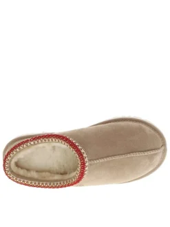 Pantoufles tasman en cuir beige avec logo iconique embossé sur le côté