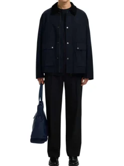 Parka en coton biologique marine uni avec une coupe ajustée et un col à revers