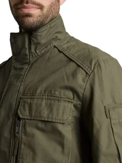 Parka en coton kaki uni avec une coupe droite et des poches plaquées à l'avant