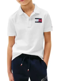 Polo coupe droite en coton blanc uni pourvu d'un col à rabats boutonné