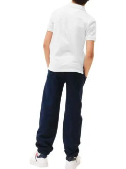 Polo coupe droite en coton blanc uni pourvu d'un col à rabats boutonné