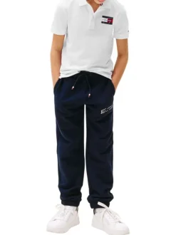 Polo coupe droite en coton blanc uni pourvu d'un col à rabats boutonné
