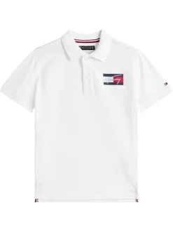 Polo coupe droite en coton blanc uni pourvu d'un col à rabats boutonné